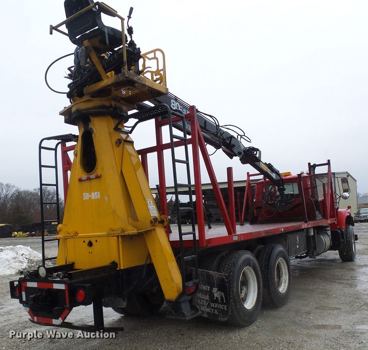 image for item DD1957 1989 Mack DM690S knuckle boom crane truck with grapple
