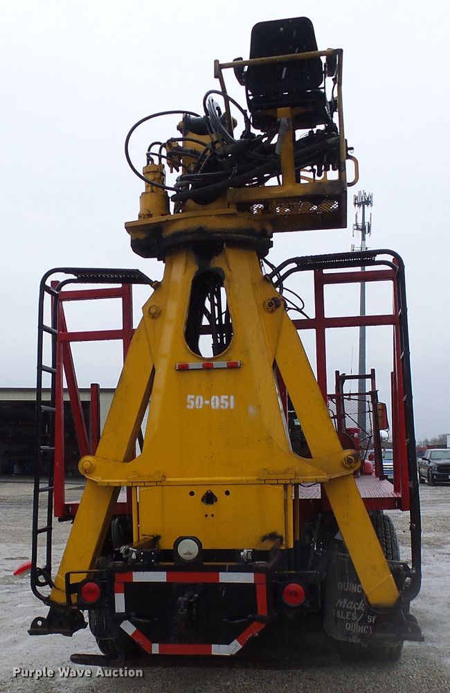 image for item DD1957 1989 Mack DM690S knuckle boom crane truck with grapple