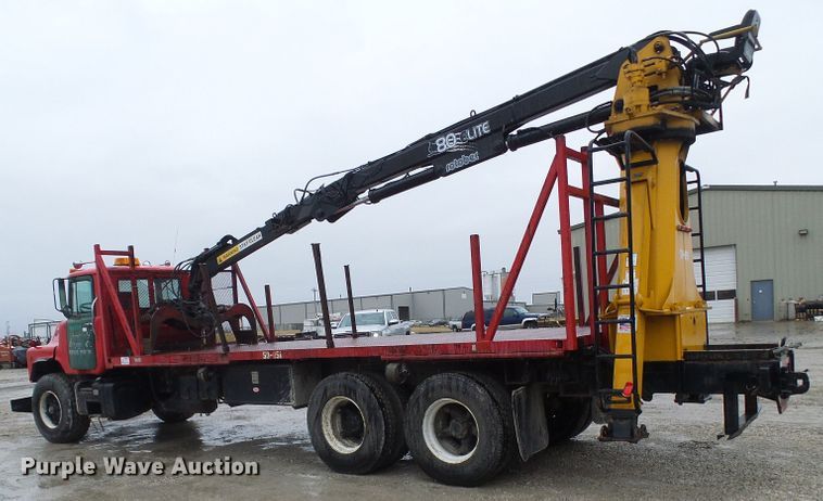 image for item DD1957 1989 Mack DM690S knuckle boom crane truck with grapple
