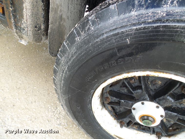 image for item DD1957 1989 Mack DM690S knuckle boom crane truck with grapple