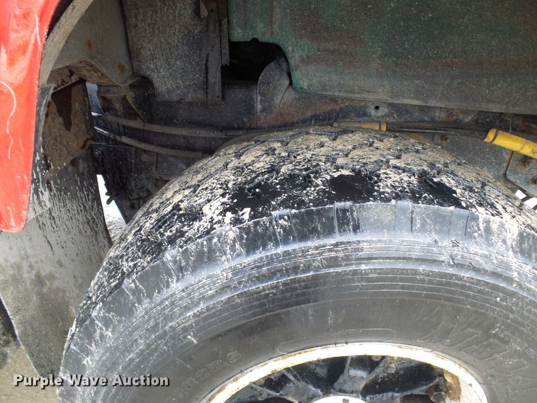 image for item DD1957 1989 Mack DM690S knuckle boom crane truck with grapple