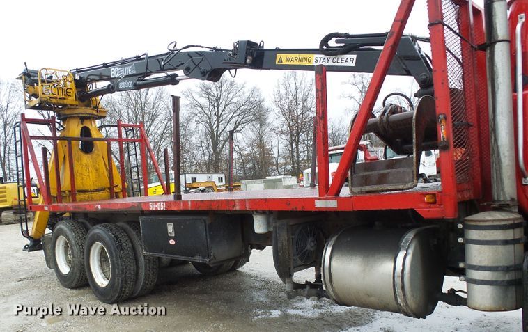 image for item DD1957 1989 Mack DM690S knuckle boom crane truck with grapple