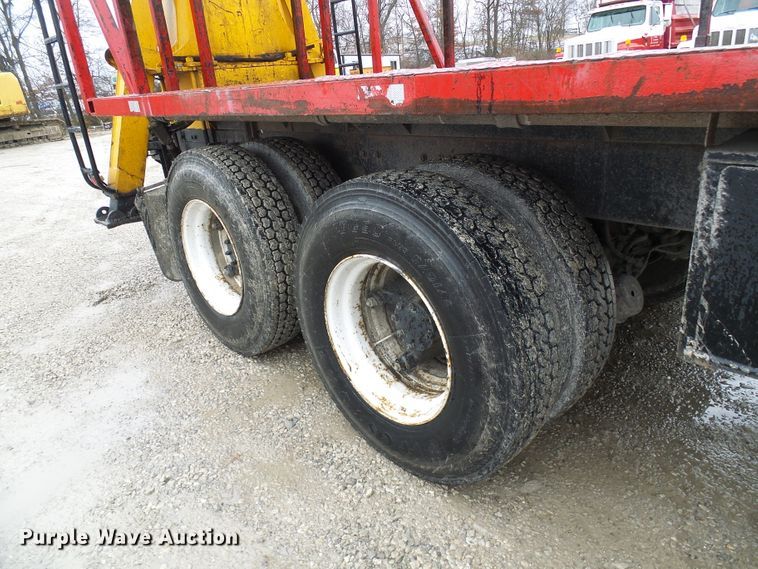 image for item DD1957 1989 Mack DM690S knuckle boom crane truck with grapple