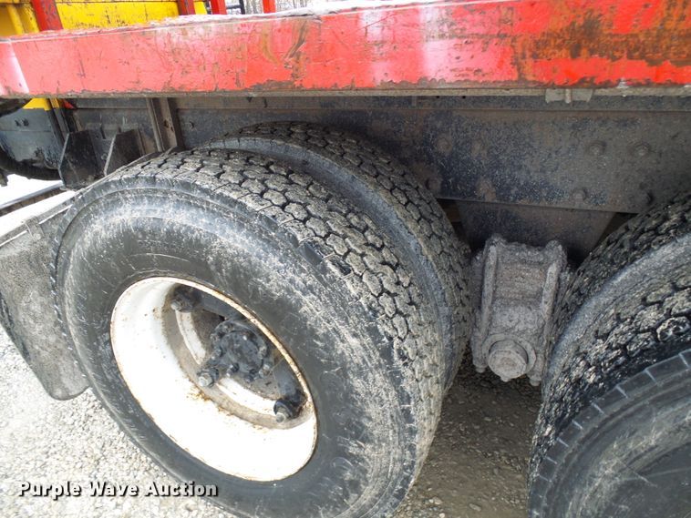 image for item DD1957 1989 Mack DM690S knuckle boom crane truck with grapple