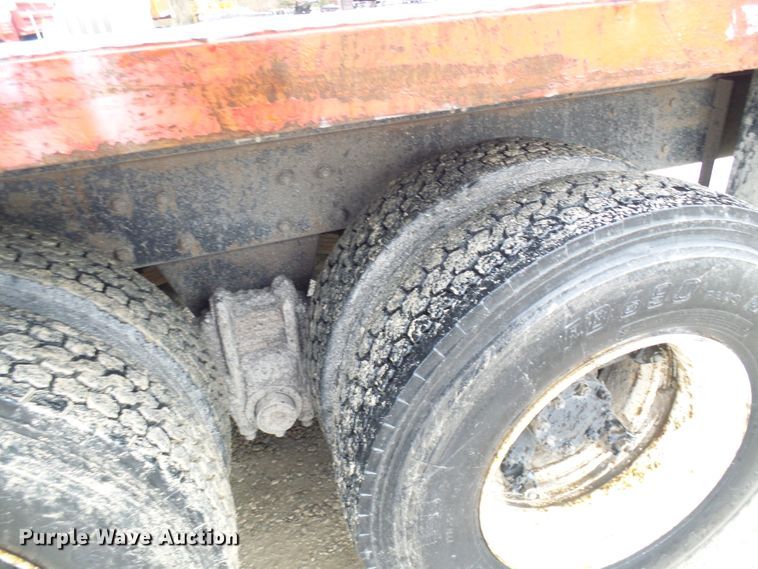 image for item DD1957 1989 Mack DM690S knuckle boom crane truck with grapple