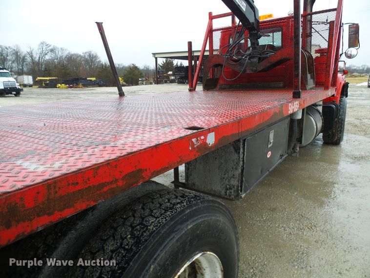 image for item DD1957 1989 Mack DM690S knuckle boom crane truck with grapple