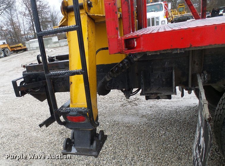 image for item DD1957 1989 Mack DM690S knuckle boom crane truck with grapple