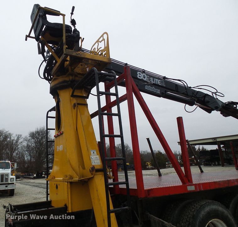 image for item DD1957 1989 Mack DM690S knuckle boom crane truck with grapple