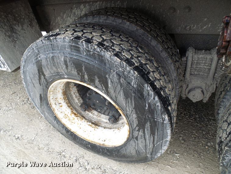 image for item DD1957 1989 Mack DM690S knuckle boom crane truck with grapple