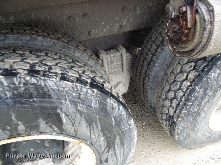 image for item DD1957 1989 Mack DM690S knuckle boom crane truck with grapple