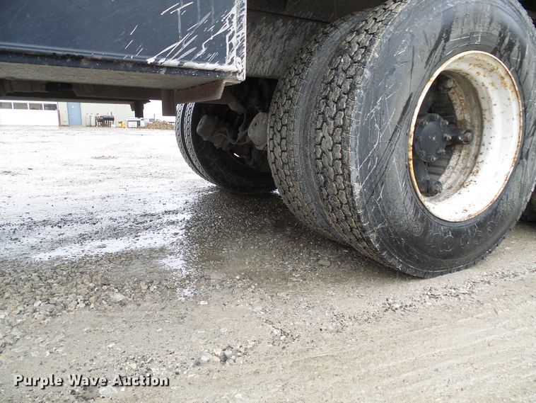 image for item DD1957 1989 Mack DM690S knuckle boom crane truck with grapple