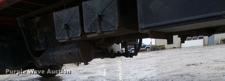 image for item DD1957 1989 Mack DM690S knuckle boom crane truck with grapple