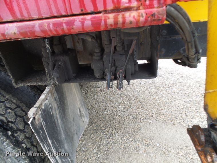 image for item DD1957 1989 Mack DM690S knuckle boom crane truck with grapple