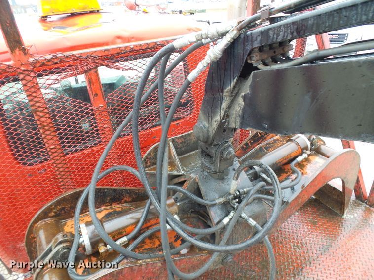 image for item DD1957 1989 Mack DM690S knuckle boom crane truck with grapple