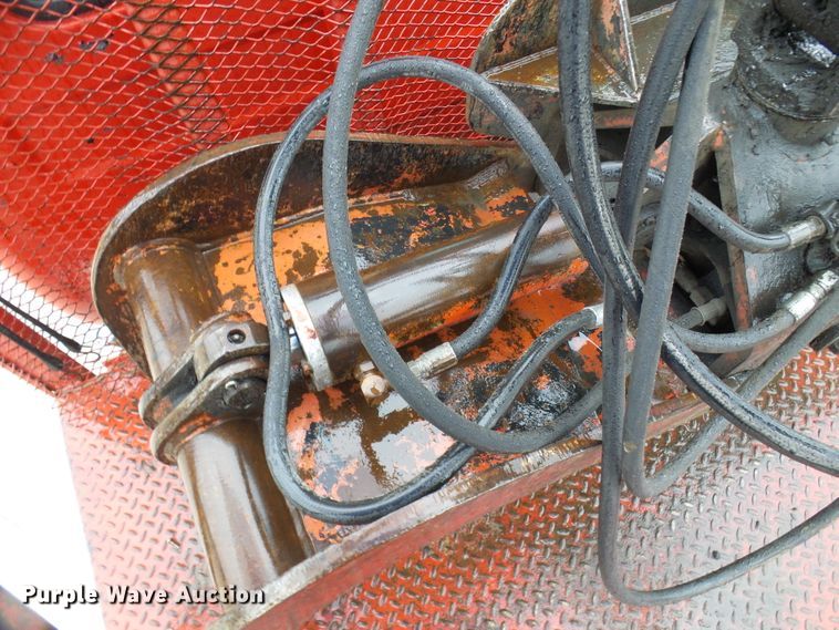 image for item DD1957 1989 Mack DM690S knuckle boom crane truck with grapple