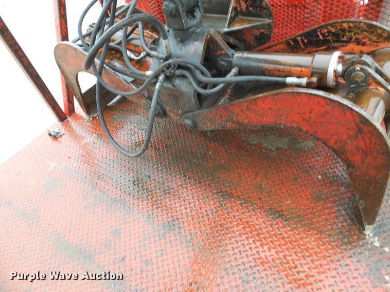 image for item DD1957 1989 Mack DM690S knuckle boom crane truck with grapple