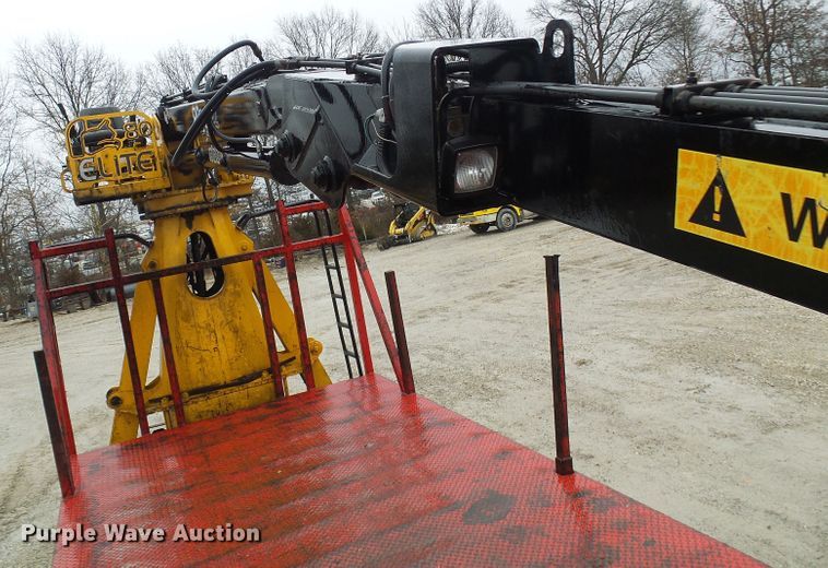 image for item DD1957 1989 Mack DM690S knuckle boom crane truck with grapple