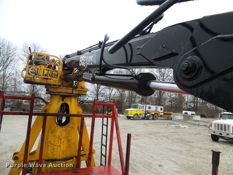 image for item DD1957 1989 Mack DM690S knuckle boom crane truck with grapple