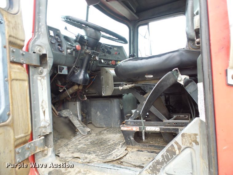 image for item DD1957 1989 Mack DM690S knuckle boom crane truck with grapple