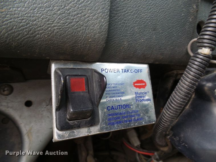 image for item DD1957 1989 Mack DM690S knuckle boom crane truck with grapple