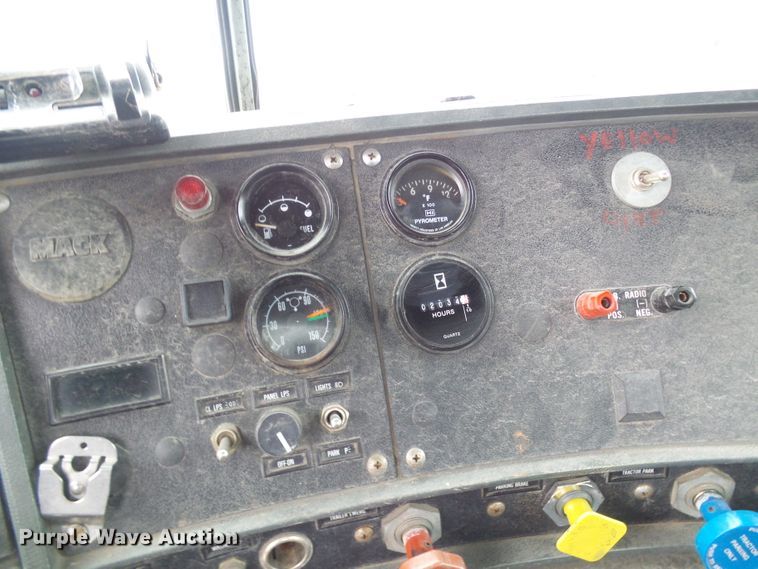 image for item DD1957 1989 Mack DM690S knuckle boom crane truck with grapple