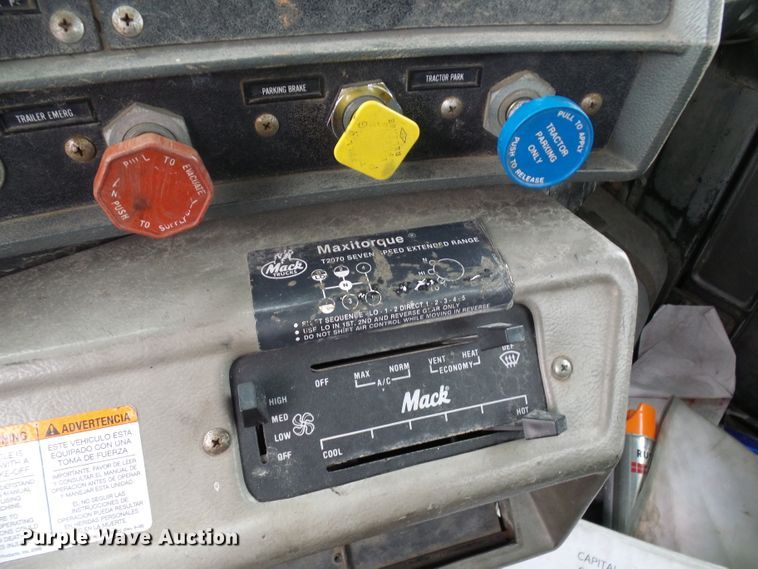 image for item DD1957 1989 Mack DM690S knuckle boom crane truck with grapple