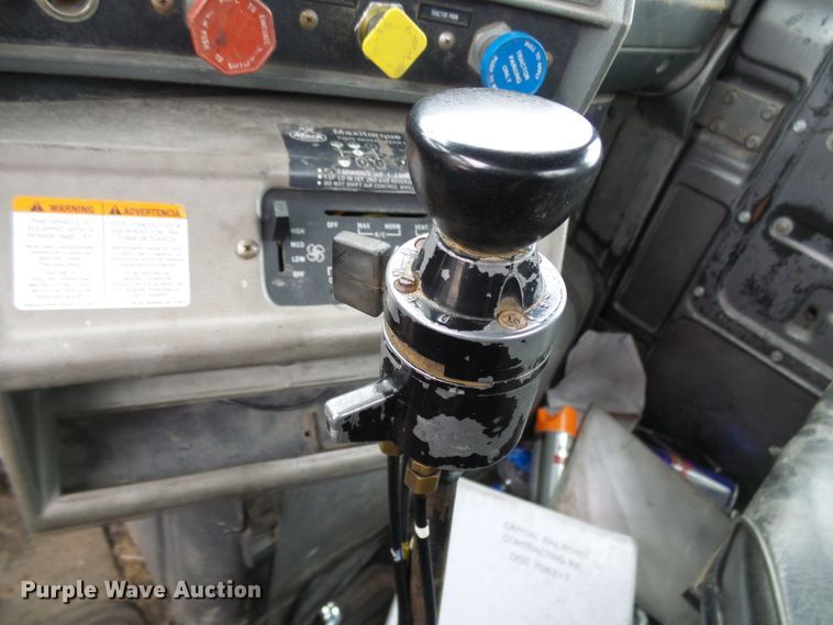 image for item DD1957 1989 Mack DM690S knuckle boom crane truck with grapple