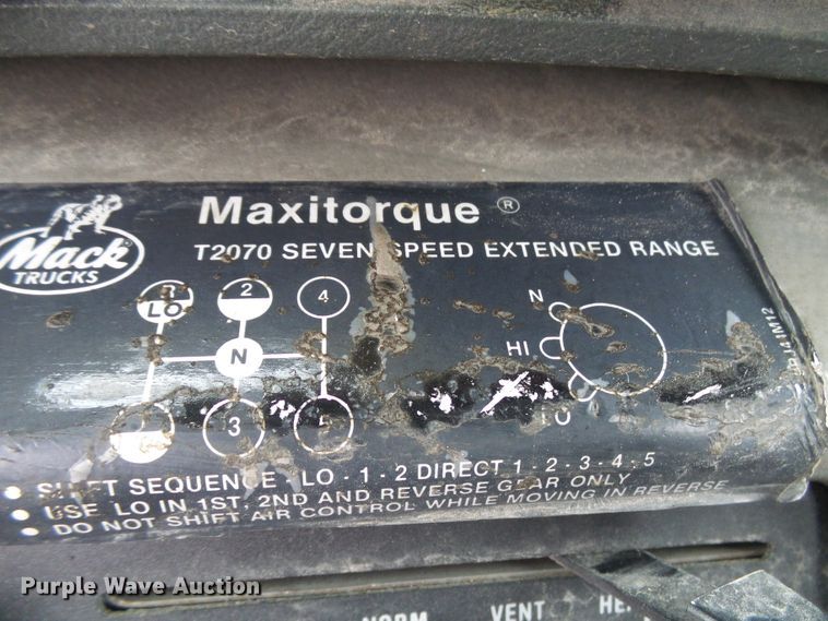 image for item DD1957 1989 Mack DM690S knuckle boom crane truck with grapple