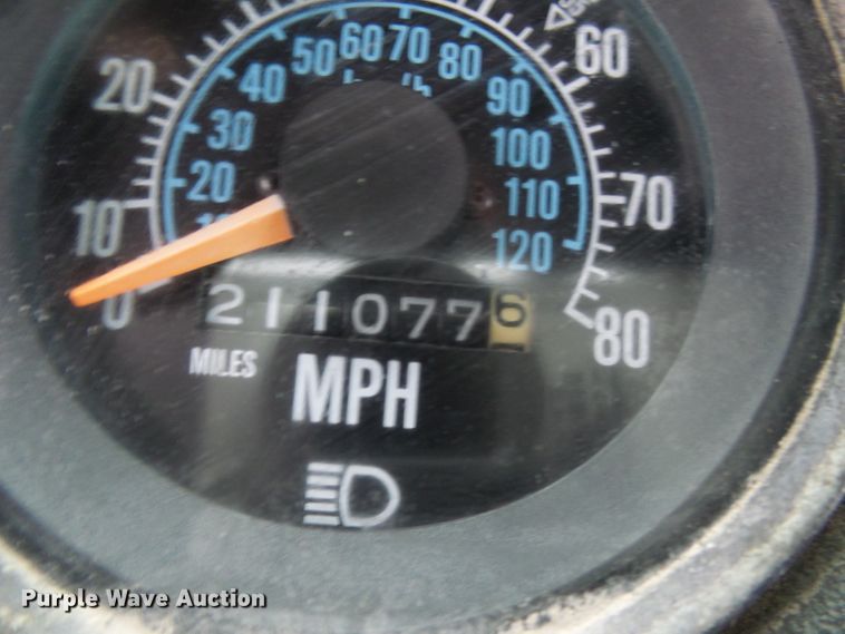 image for item DD1957 1989 Mack DM690S knuckle boom crane truck with grapple