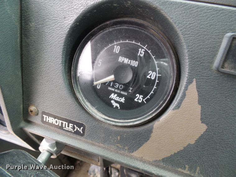 image for item DD1957 1989 Mack DM690S knuckle boom crane truck with grapple