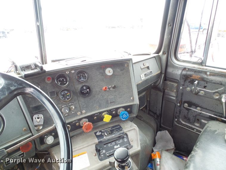 image for item DD1957 1989 Mack DM690S knuckle boom crane truck with grapple