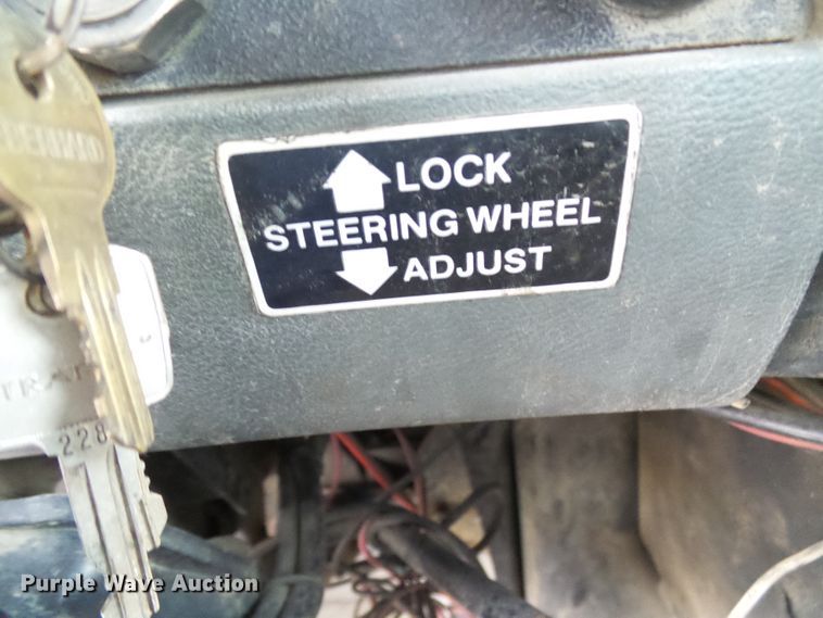 image for item DD1957 1989 Mack DM690S knuckle boom crane truck with grapple