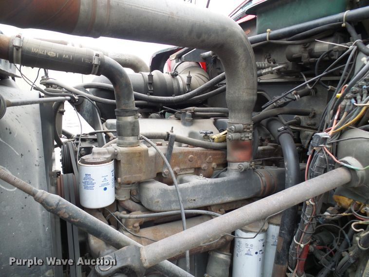 image for item DD1957 1989 Mack DM690S knuckle boom crane truck with grapple