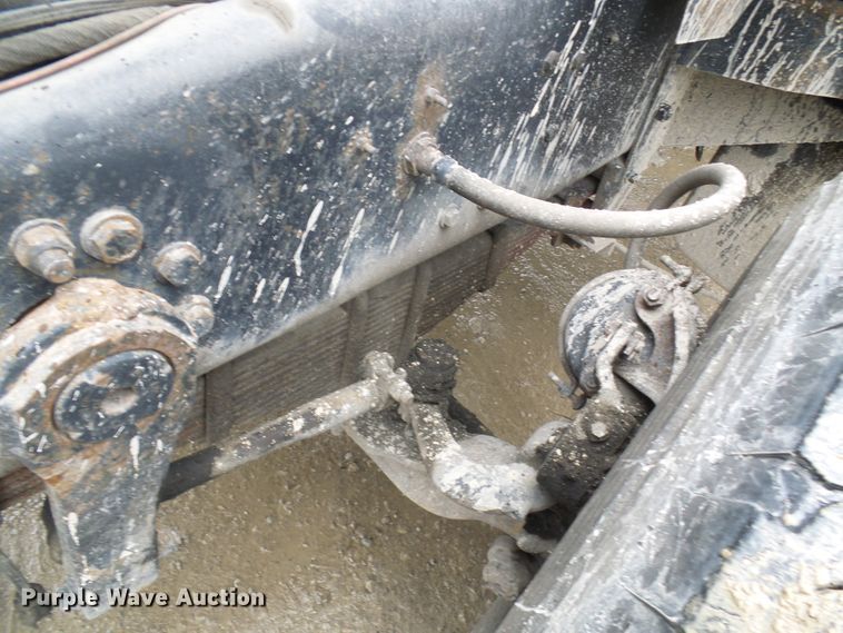 image for item DD1957 1989 Mack DM690S knuckle boom crane truck with grapple