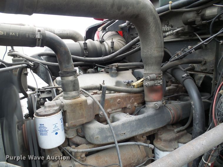 image for item DD1957 1989 Mack DM690S knuckle boom crane truck with grapple