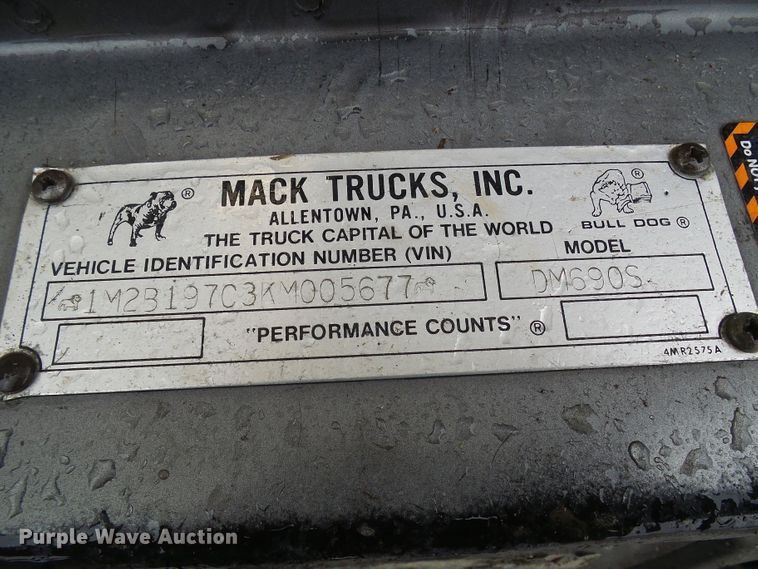image for item DD1957 1989 Mack DM690S knuckle boom crane truck with grapple
