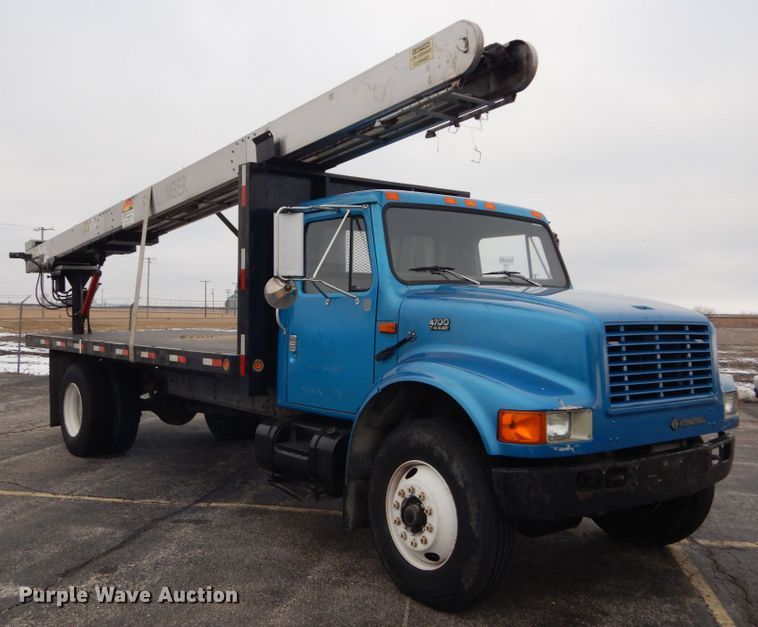 image for item GB9763 1995 International 4700 dump flatbed truck with conveyor