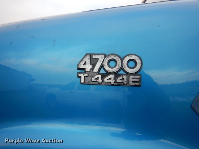 image for item GB9763 1995 International 4700 dump flatbed truck with conveyor