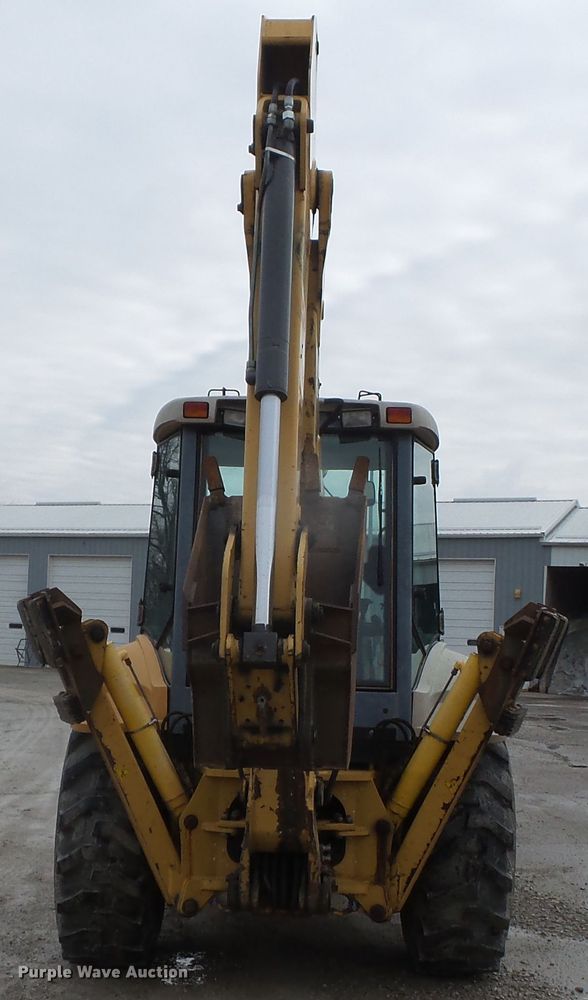 image for item DH7842 New Holland 555E backhoe