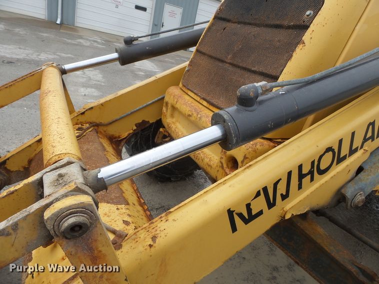 image for item DH7842 New Holland 555E backhoe