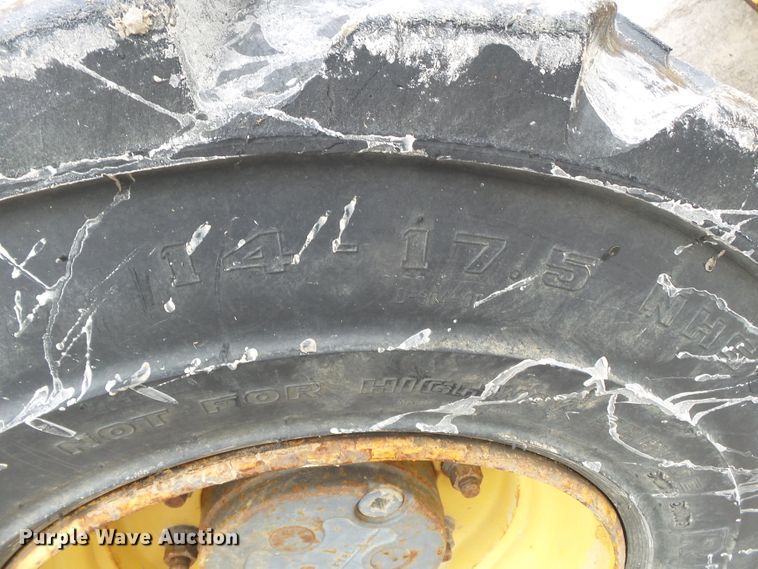 image for item DH7842 New Holland 555E backhoe