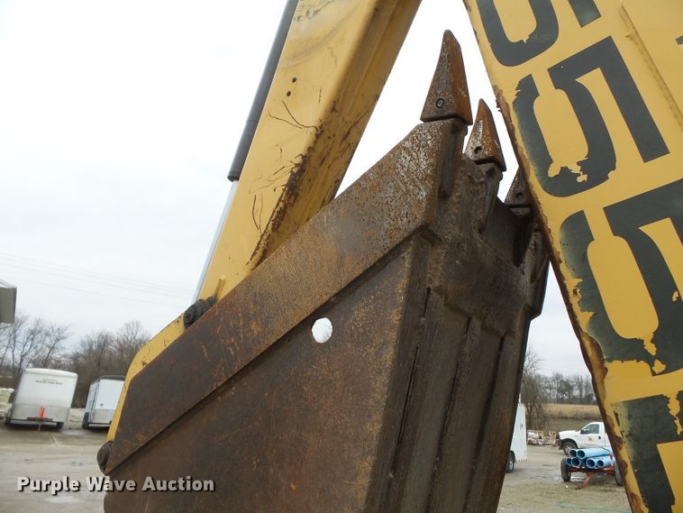 image for item DH7842 New Holland 555E backhoe