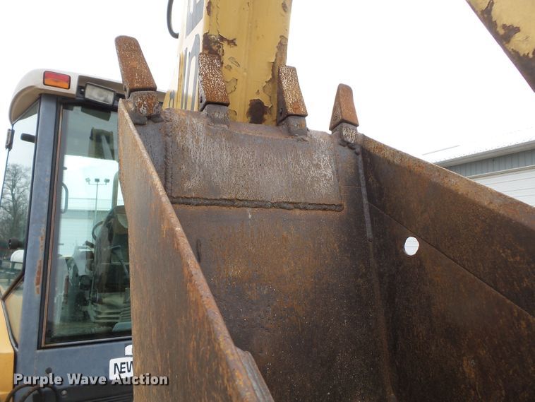 image for item DH7842 New Holland 555E backhoe