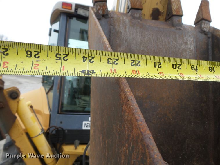image for item DH7842 New Holland 555E backhoe