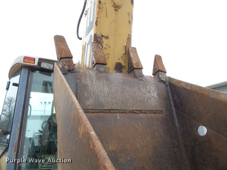 image for item DH7842 New Holland 555E backhoe