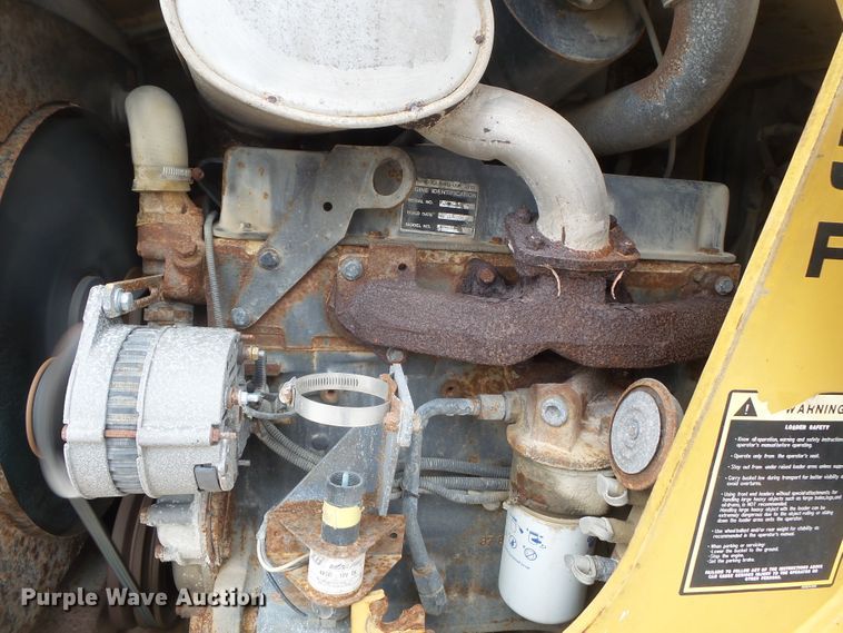 image for item DH7842 New Holland 555E backhoe