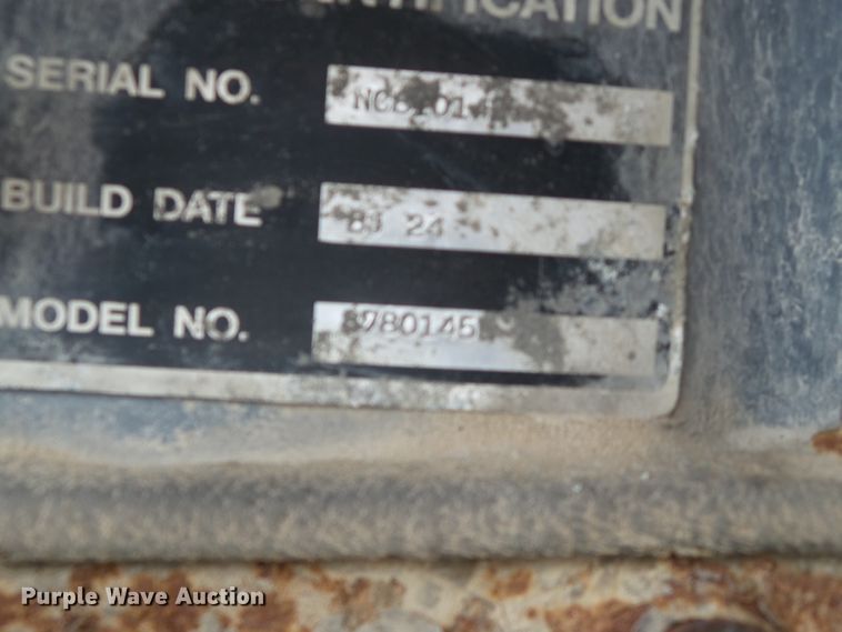 image for item DH7842 New Holland 555E backhoe