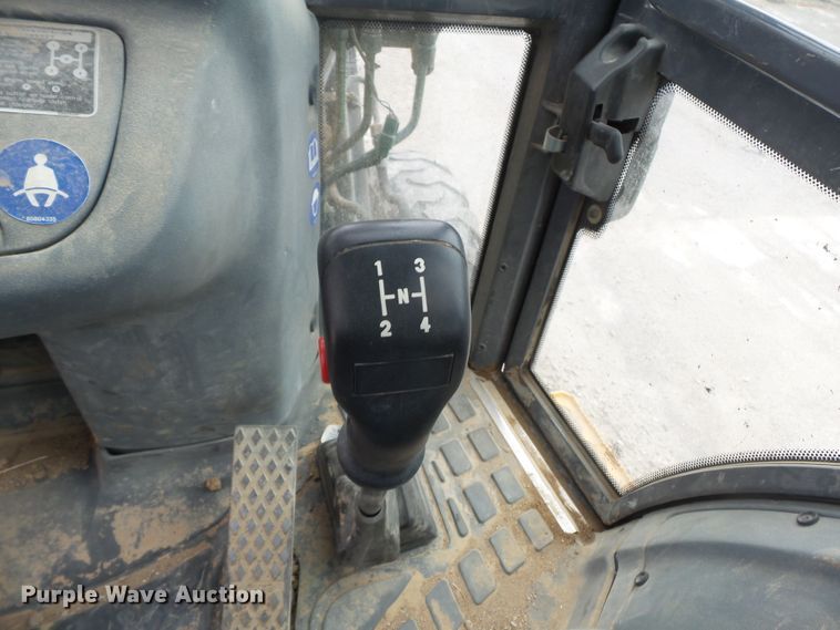 image for item DH7842 New Holland 555E backhoe