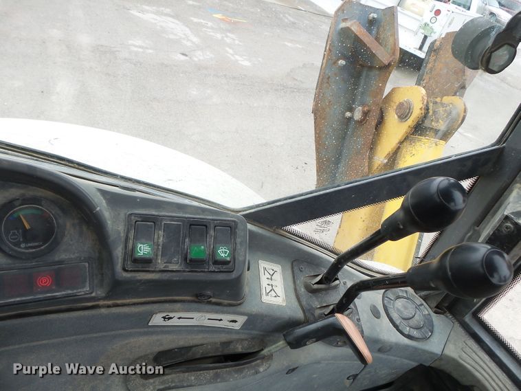 image for item DH7842 New Holland 555E backhoe