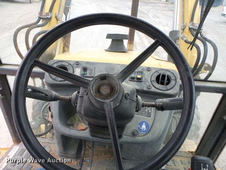 image for item DH7842 New Holland 555E backhoe